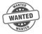 wanted stamp. wanted round grunge sign.