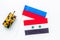 War, confrontation concept. Russia, Syria. Tanks toy near russian and Syrian flag on white background top view