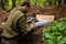 War in Ukraine, Ukrainian serviceman preparing a shell for a 120mm, Bakhmut area, Ukraine - 11 May 2023