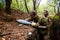 War in Ukraine, Ukrainian serviceman writing a message on a shell for a 120mm, Bakhmut area, Ukraine - 11 May 2023