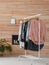 Wardrobe rack with stylish clothes