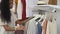 Wardrobe to keep clothes black lady hangs and adjusts blouse Spbd