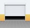 Warehouse or garage roller shutter door. Factory roller door entrance, floor building store shop interior