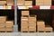 Warehouse stocked with boxes in stacks