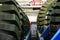 Warehouse with tires for trucks at an industrial plant for the production of cars. The protector of a large rubber wheel.