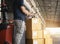 Warehouse Worker Holding Clipboard Doing Inventory Management Package Boxes. Check Stock. Shipment Boxes.