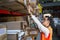 Warehouse worker looking for goods on the shelves.