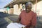 Warehouse Worker Reading Documents