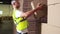 Warehouse worker stacking cardboard boxes