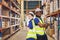 warehouse worker team portrait multiracial standing together happy smiling for industry labor enjoy working teamwork