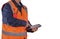 Warehouse Workers wearing reflective jacket with tablet in hand.