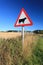 Waring sign for cow in the country side in Aberdeen, Scotland U