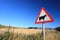 Waring sign for cow in the countryside in Aberdeen