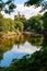 Warkworth Castle reflected in the River Coquet, Morpeth, Northumberland, UK