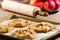 Warm apple tarts with rolling pin
