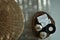 Warm atmosphere in spa resort, Close up of spa essentials and towels on wooden tray in bathroom, essential oil.