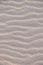 Warm beige wavy sand texture, vertical