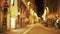 Warm blurry night scene on typical small European street