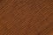 Warm brown crinkled fabric background texture