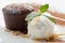 Warm chocolate cake Fondant with ice-cream ball, almond, mint, c