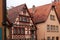 Warm colored typical German wood framed houses in Rothenburg