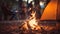 Warm cozy campfire flames dance in dusk with tent camping background inviting atmosphere for camping