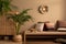 Warm and cozy ethno living room interior with couch, patterned pillows, plants i flowerpots, fern, rattan sideboard, basket on