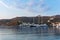 Warm dawn colors over the harbor of Patmos island, Dodecanese, Greece