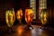 warm glow of stained glass lamps in dim room