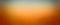 Warm gradient colors of orange gold and green in a smooth texture blur and dark blue border design in abstract blurred background