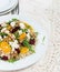 Warm Healthy quinoa, brown rice, cooked beetroot and orange salad