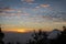 Warm morning sunrise on Ghober Hut campsite with view of mount Cikuray. Beautiful landscape of mount Papandayan. Papandayan