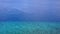 Warm panorama of marine coast beach adventure by blue ocean and clean sandy background after sunrise