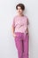 Warm pink kit for sleeping. Soft cotton t-shirt and pants. Comfortable clothes for healthy sleep. Pajamas concept.