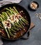 Warm salad with asparagus, cheese, nuts