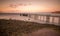 Warm sky at sunset with Llandudno pier