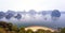 Warm sun light in Halong Bay Vietnam at sunrise. Panoramic lands