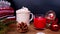 Warm sweater, a cup of hot cocoa with marshmallows, candles, gifts, sweets, concept of merry christmas, cozy winter mood, holiday