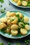 Warm vegetarian new baby potato salad with petit pois peas, Dijon mustard and capers dressing, served with fresh dill