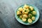 Warm vegetarian new baby potato salad with petit pois peas, Dijon mustard and capers dressing, served with fresh dill
