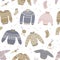Warm winter and autumn woolen sweaters in Scandinavian style seamless pattern. Trendy flat design elements for winter