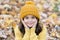 Warm woolen accessory. Girl long hair happy face autumn nature background. Lovely season. Keep warmest this autumn