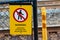 Warning authorized personnel sign on a chain link fence