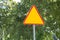 Warning - cattle - road sign standing on the roadside. Empty street ahead.Blank road sign standing on the roadside. Empty street a