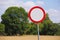 Warning - cattle - road sign standing on the roadside. Empty street ahead.Blank road sign standing on the roadside. Empty street a