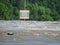 Warning, Danger sign near dam on the Arkansas River