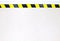 Warning hazard construction stripes sign or symbol texture isolated in granite concrete floor background, for safety first in lab.