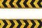 Warning hazard grunge pattern in yellow and black color on white background