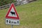 Warning road sign for animal presence long an Italian mountain street