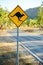 Warning road sign showing a kangaroo shape
